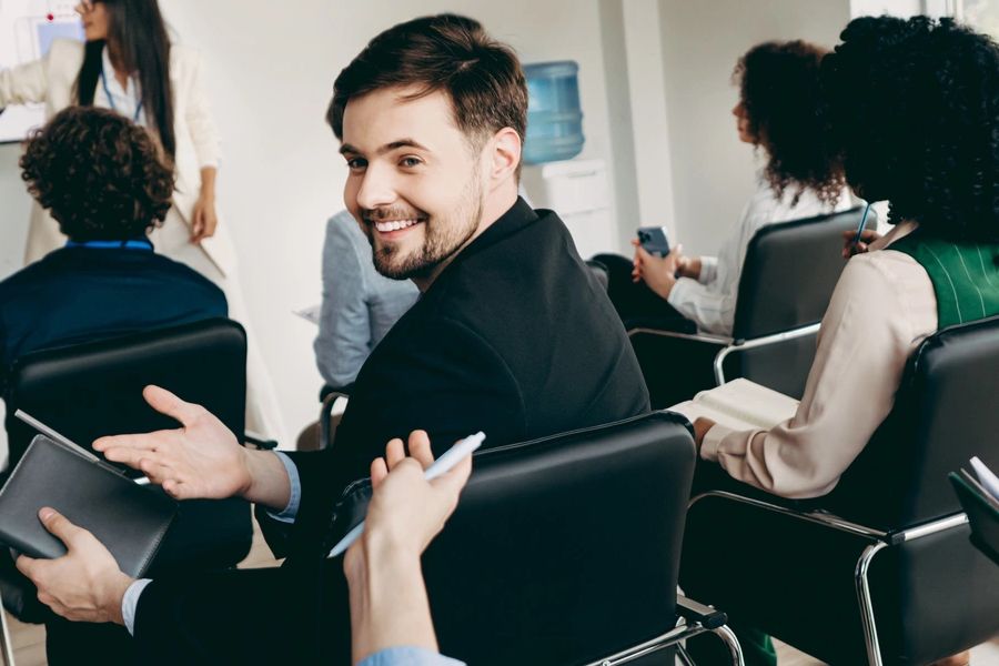 Professionals collaborating in a corporate training session